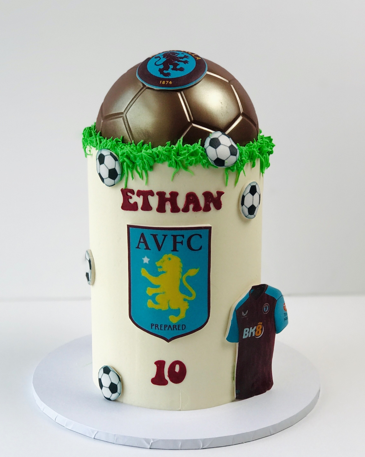 Football themed celebration cake with chocolate ball and sugar shirt