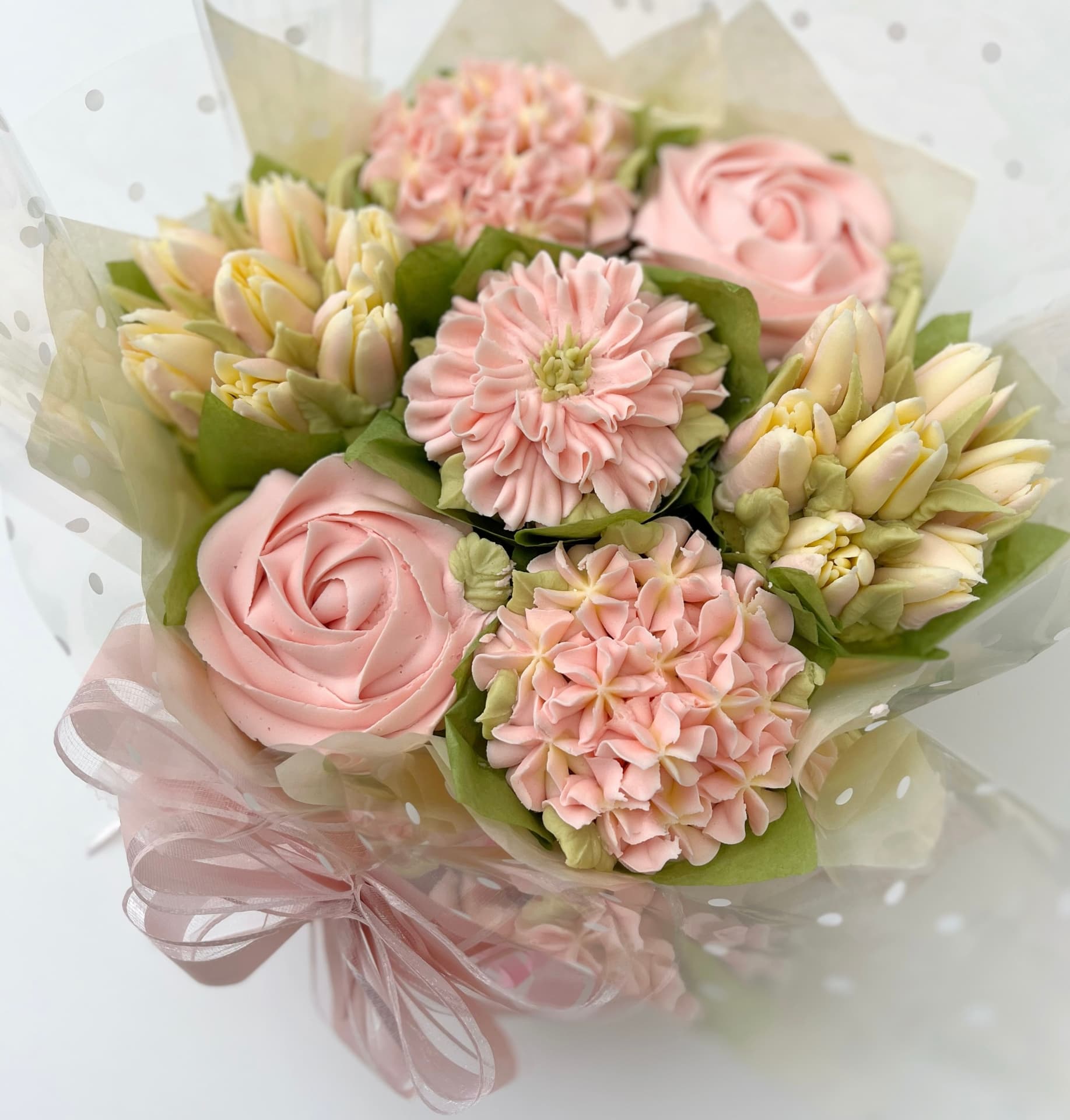 Classic 7-cupcake bouquet in soft pink buttercream blooms