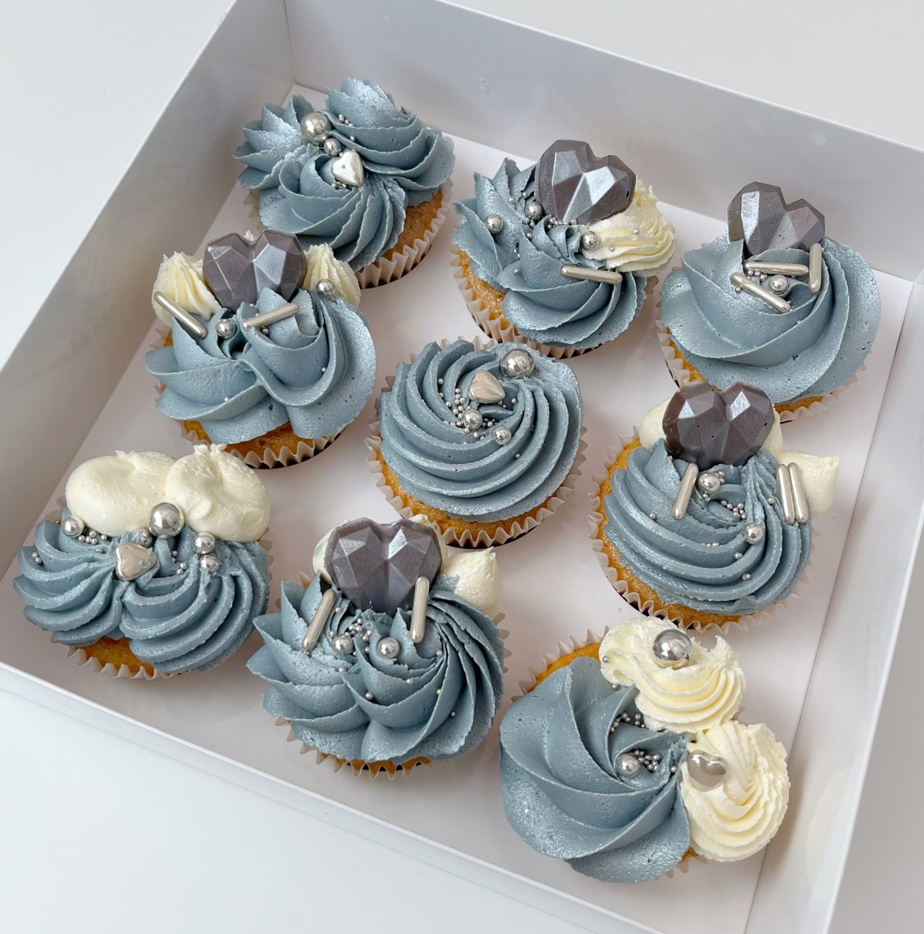 Elegance Collection cupcakes with silvery blue piped swirls